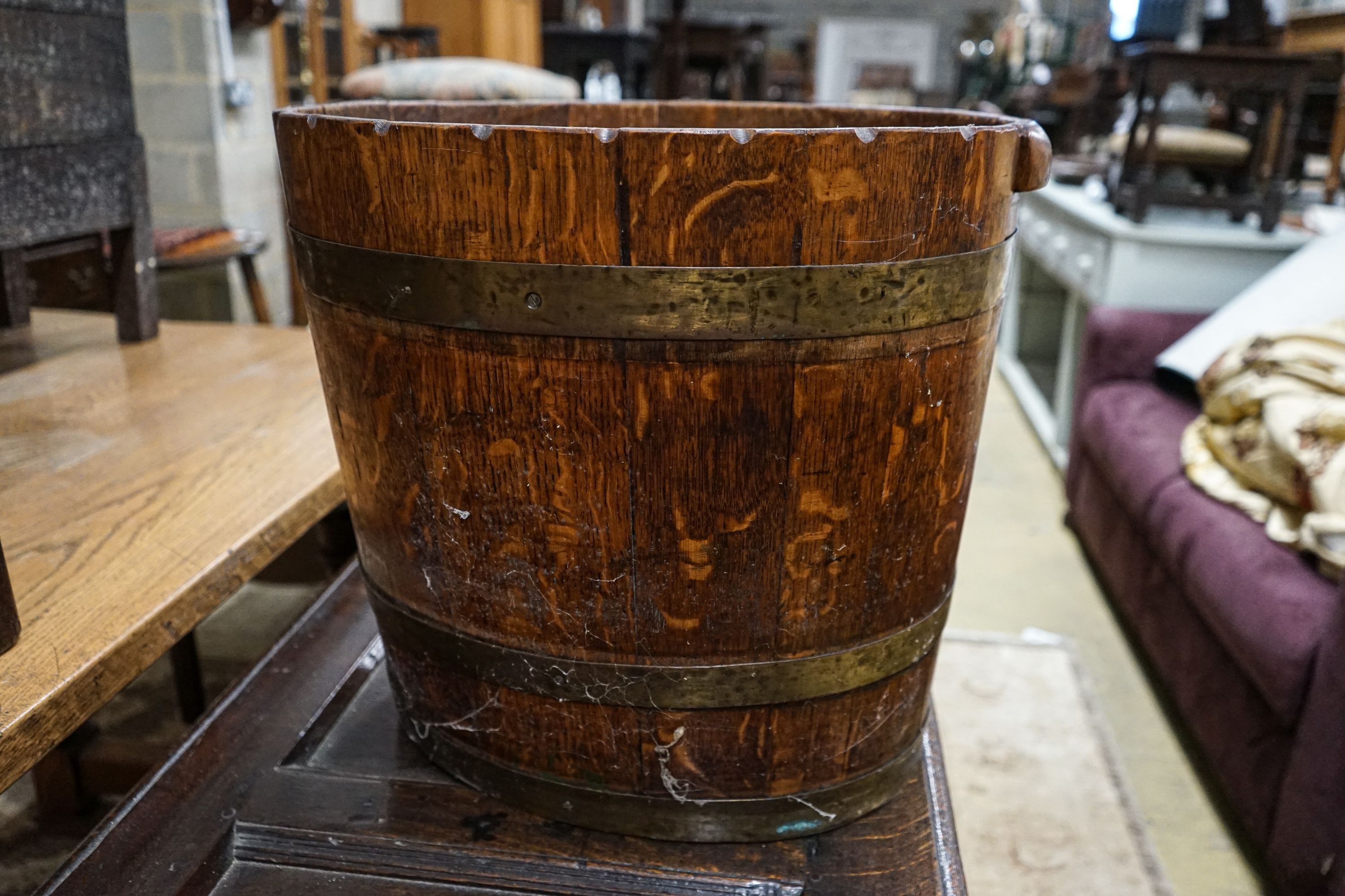 A brass bound staved oak log bin, width 52cm, height 46cm